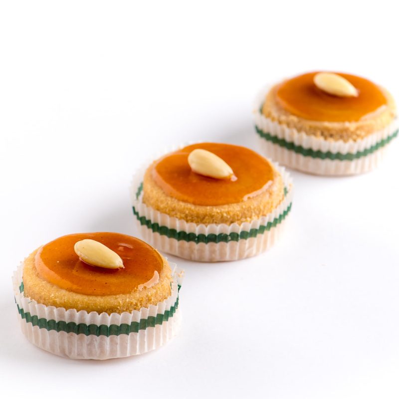 Three Amore pastries, layers of shortbread biscuit filled with buttercream
